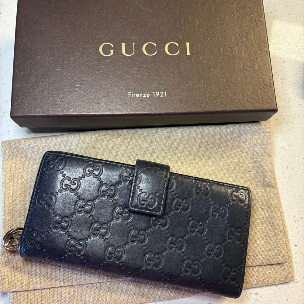 Authentic Gucci Embossed Leather Wallet
